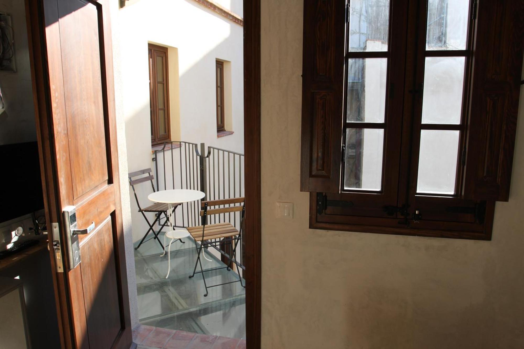 Quarto Individual com Varanda